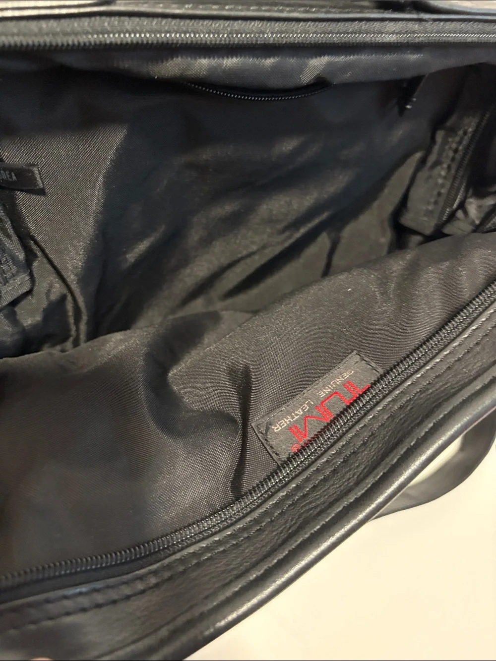 Tumi Black Laptop Backpack with Red Logo Accent